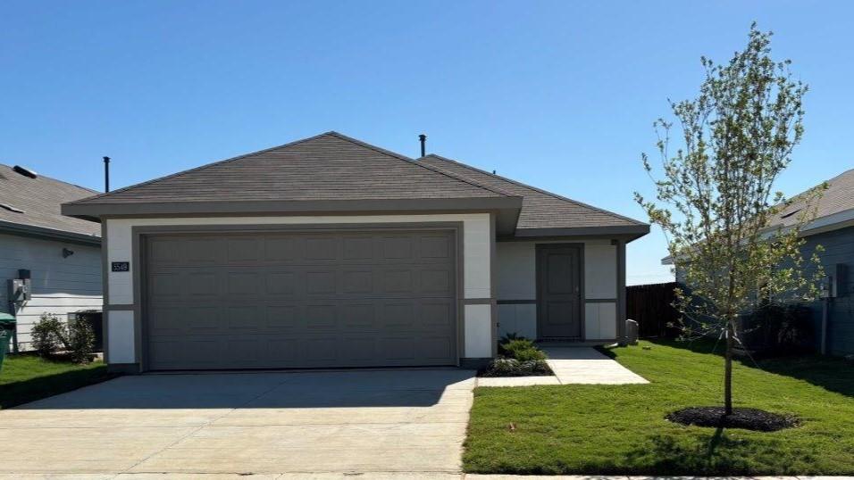 5549 Corduroy Road Krum, TX 76249 - Photo 1 of 1 a front view of a house with a yard