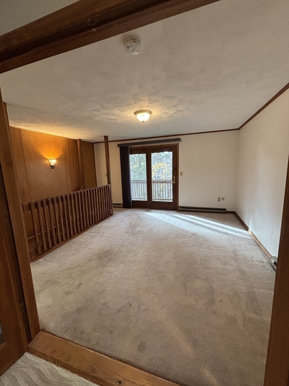 97-99 Roffee Street, Unit 1 Barrington, RI 02806 - Photo 11 of 28 a view of an empty room with windows