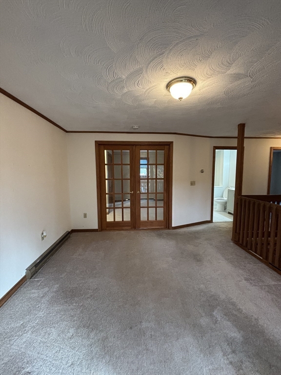 97-99 Roffee Street, Unit 1 Barrington, RI 02806 - Photo 9 of 28 a view of an empty room with a window