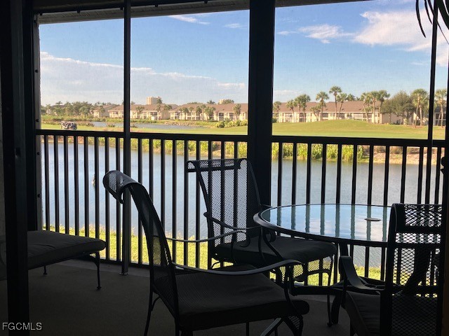 16200 Kelly Cove Drive, Unit 215 Fort Myers, FL 33908 - Photo 24 of 46 a view of a chairs on the roof deck