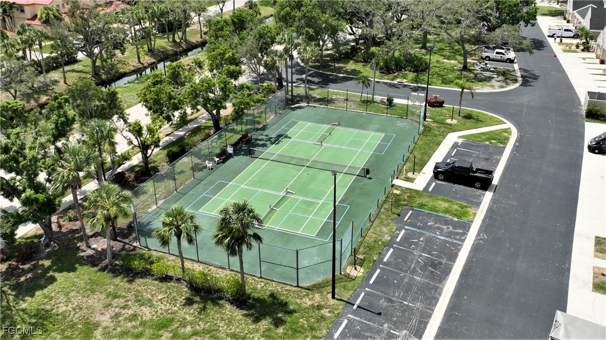 16200 Kelly Cove Drive, Unit 215 Fort Myers, FL 33908 - Photo 41 of 46 a green field with lots of trees