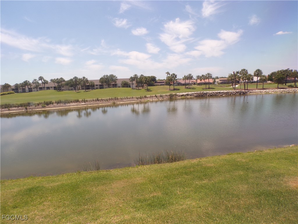 16200 Kelly Cove Drive, Unit 215 Fort Myers, FL 33908 - Photo 46 of 46 a view of a lake with a city