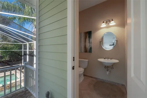 a bathroom with a toilet and a sink