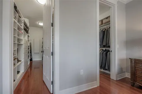 a view of hallway with walk in closet
