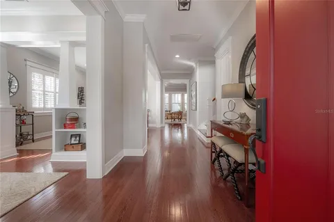 a hallway with wooden floor