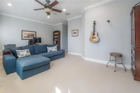 a living room with furniture and a table