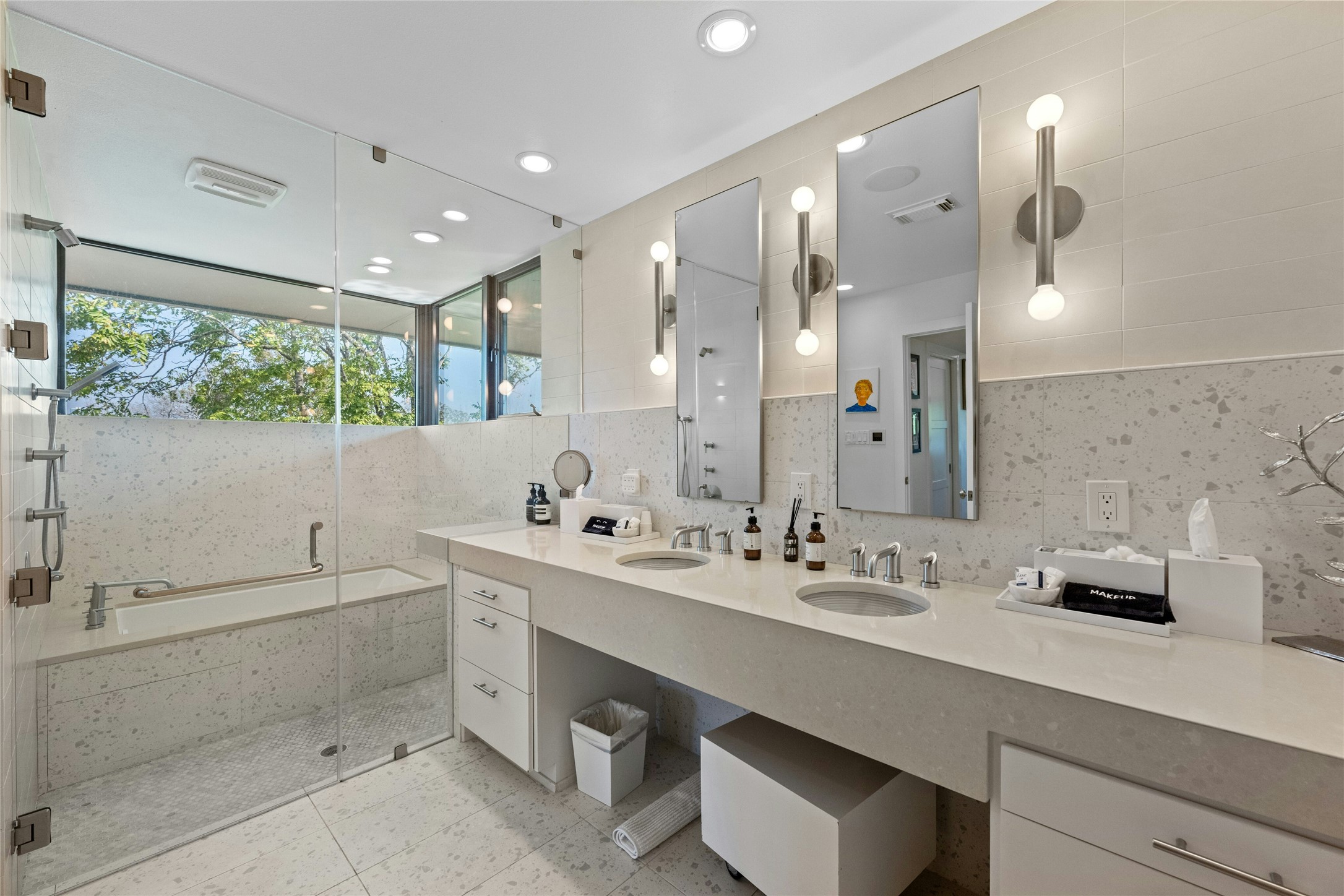 2409 East Side Drive Austin, TX 78704 - Photo 21 of 40 a bathroom with a double vanity sink mirror and shower