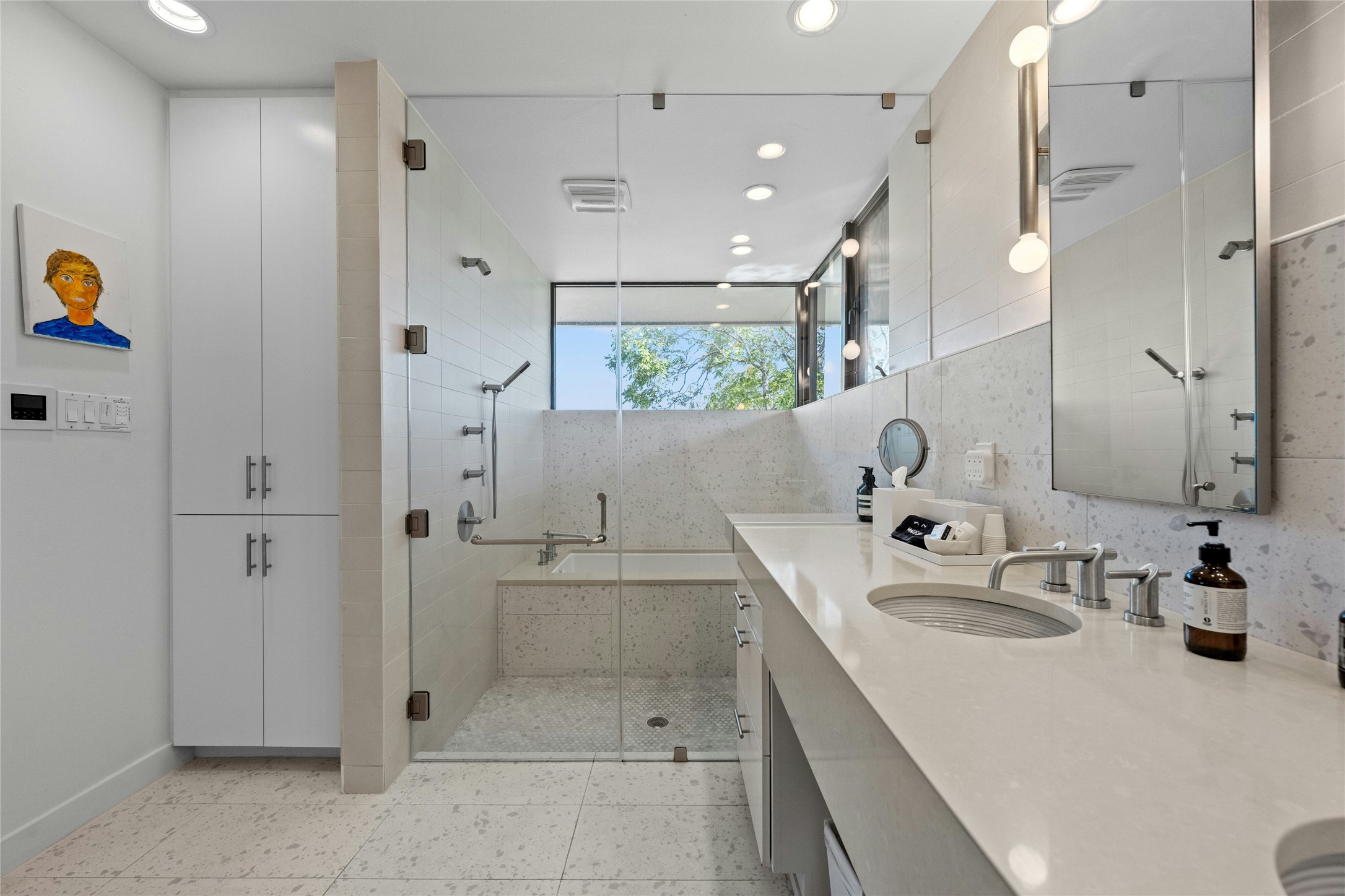 2409 East Side Drive Austin, TX 78704 - Photo 22 of 40 a bathroom with a sink and a mirror