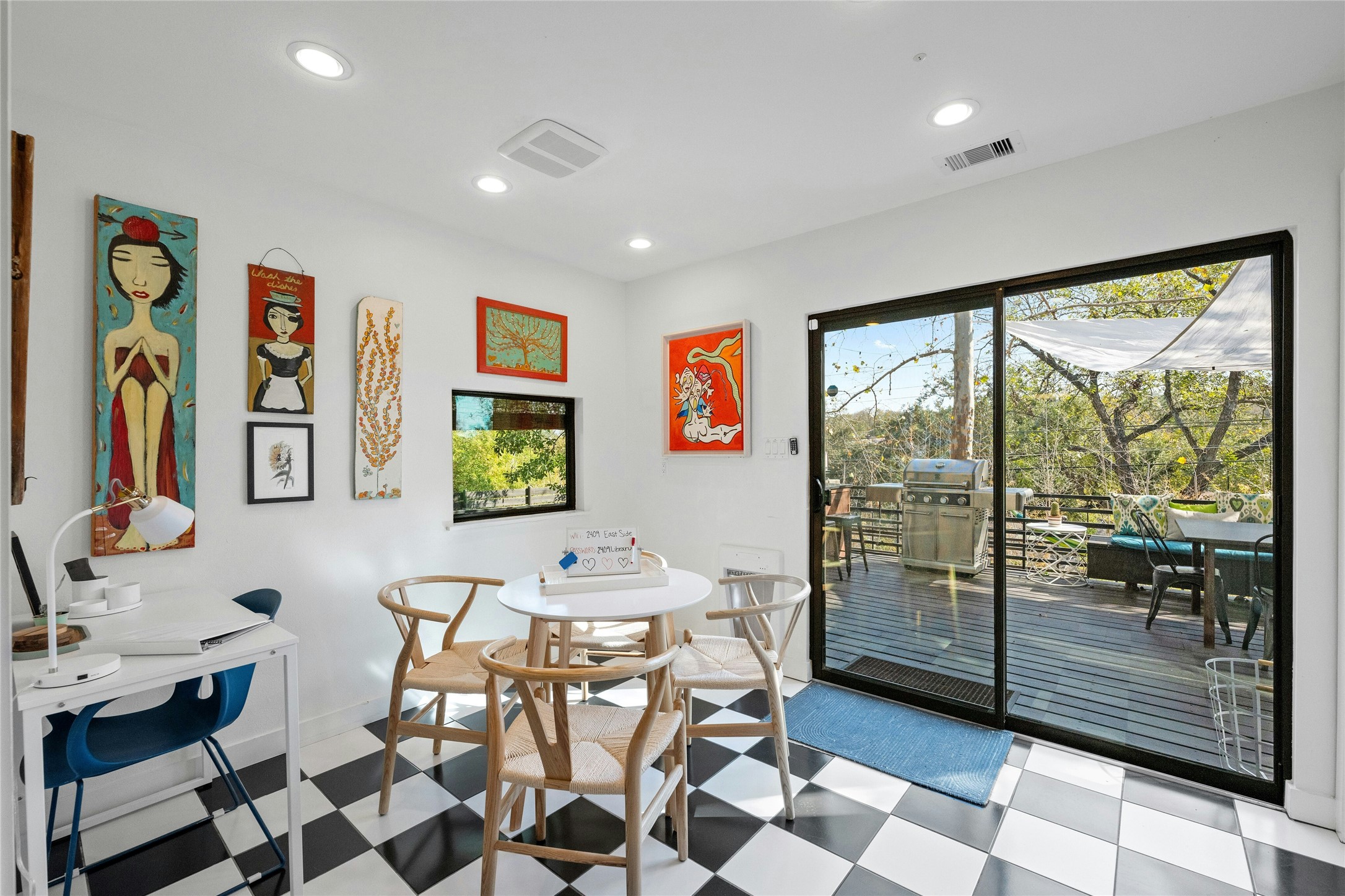 2409 East Side Drive Austin, TX 78704 - Photo 31 of 40 a living room with furniture and a flat screen tv