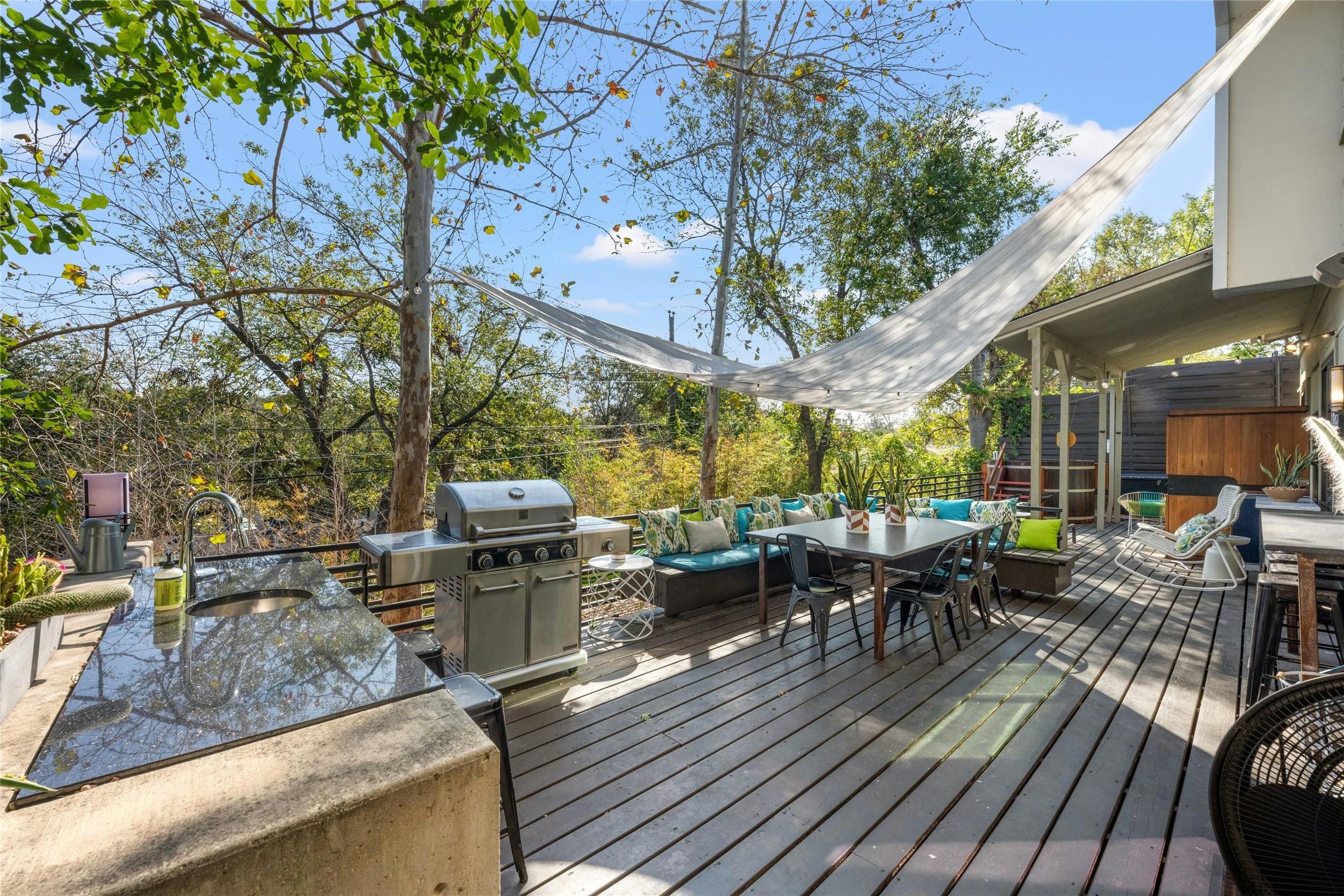 2409 East Side Drive Austin, TX 78704 - Photo 32 of 40 a view of a patio with couches table and chairs and potted plants