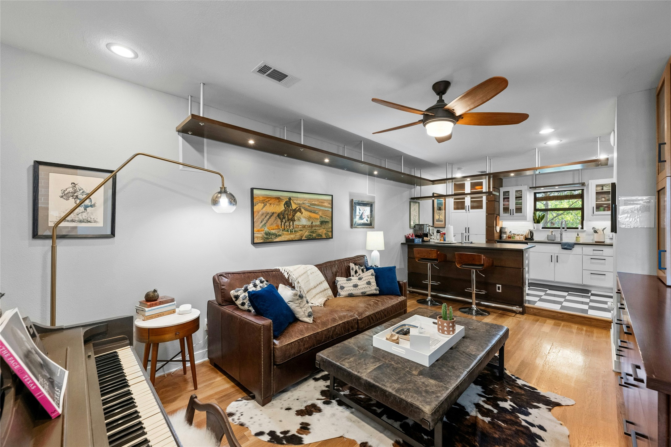 2409 East Side Drive Austin, TX 78704 - Photo 6 of 40 a living room with furniture and a wooden floor
