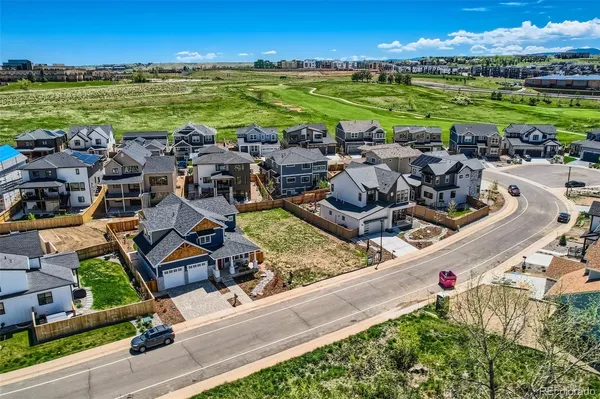 view of a yard from a balcony
