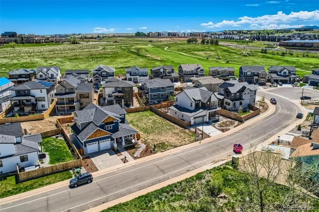 view of a yard from a balcony