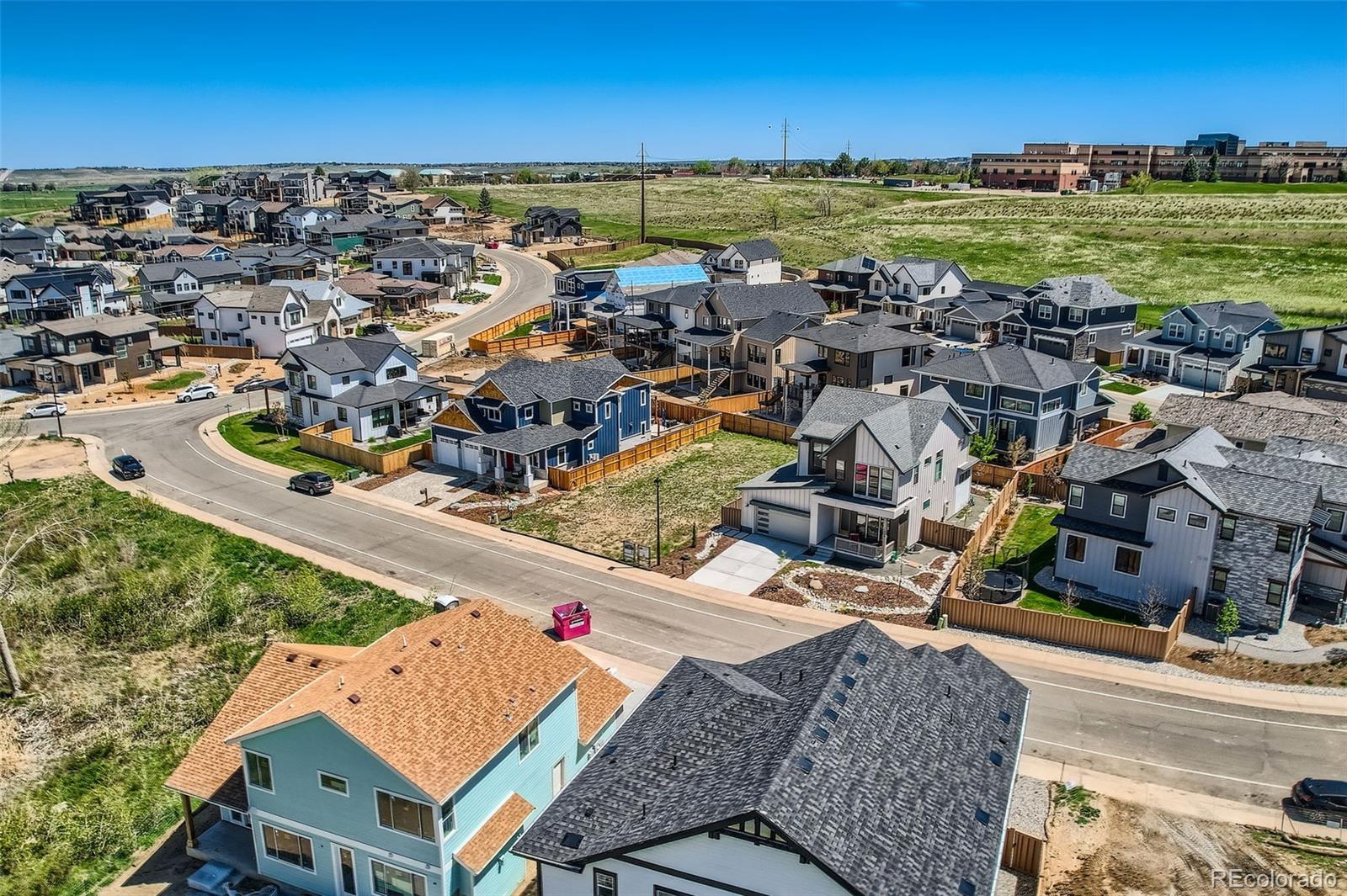 1002 Turnberry Circle Louisville, CO 80027 - Photo 13 of 16 an aerial view of residential houses with outdoor space