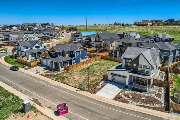 an aerial view of a house with a ocean view