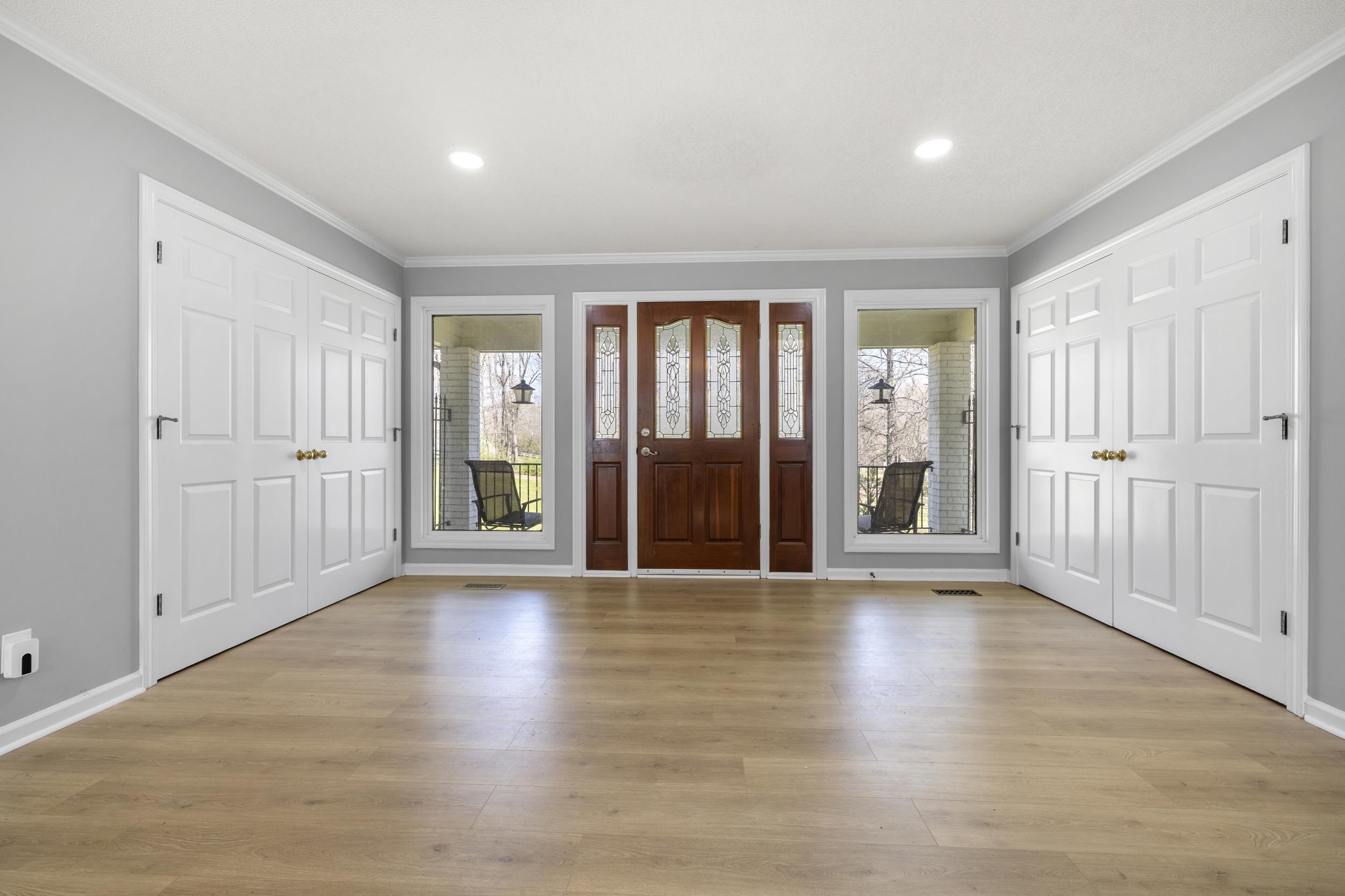 460 Woodbridge Road Somerville, TN 38068 - Photo 5 of 40 Entrance foyer with ornamental molding, light wood finished floors, and recessed lighting