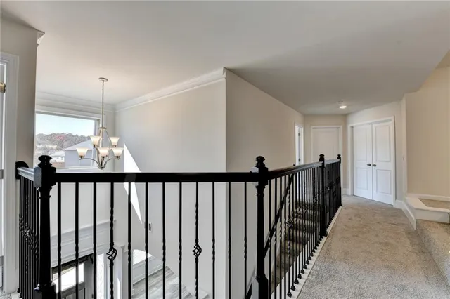 a view of an empty room and entryway