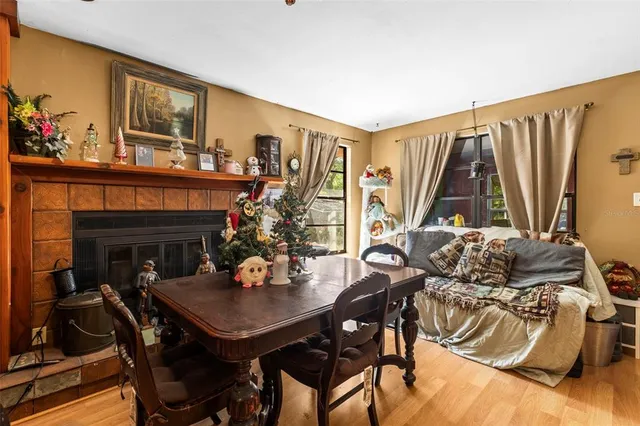 a view of a dining room with furniture and window