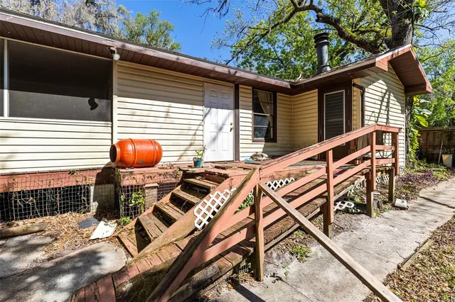 a backyard of a house with seating space