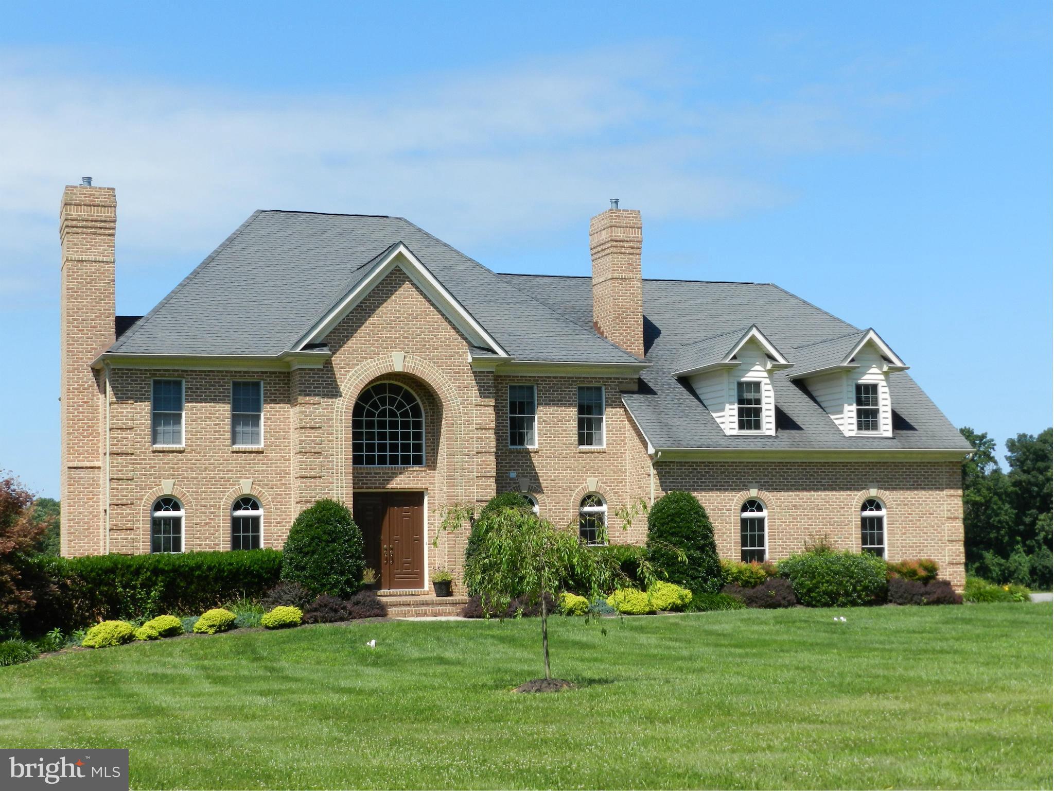 3808 Houcks Road Monkton, MD 21111 - Photo 1 of 30 a front view of a house with a yard