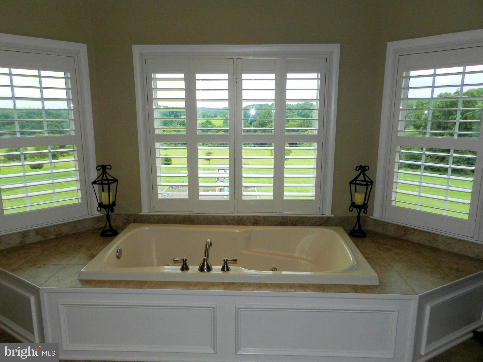 3808 Houcks Road Monkton, MD 21111 - Photo 23 of 30 a bathroom with mirror sink and window