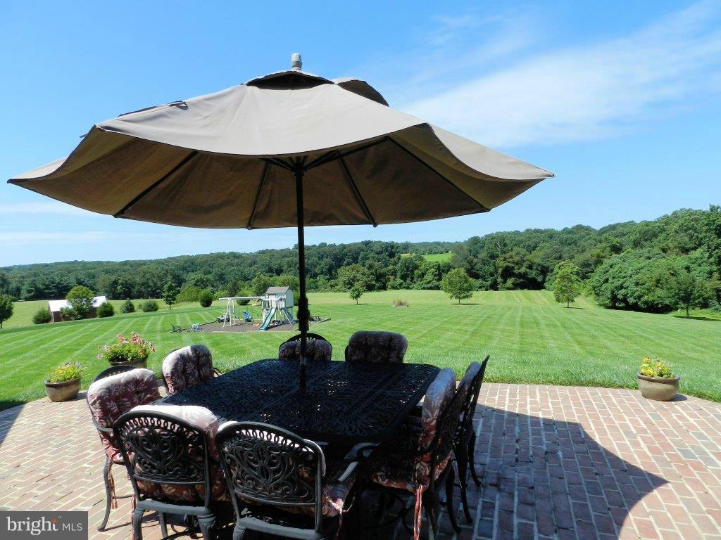 3808 Houcks Road Monkton, MD 21111 - Photo 5 of 30 a view of a patio with furniture and yard