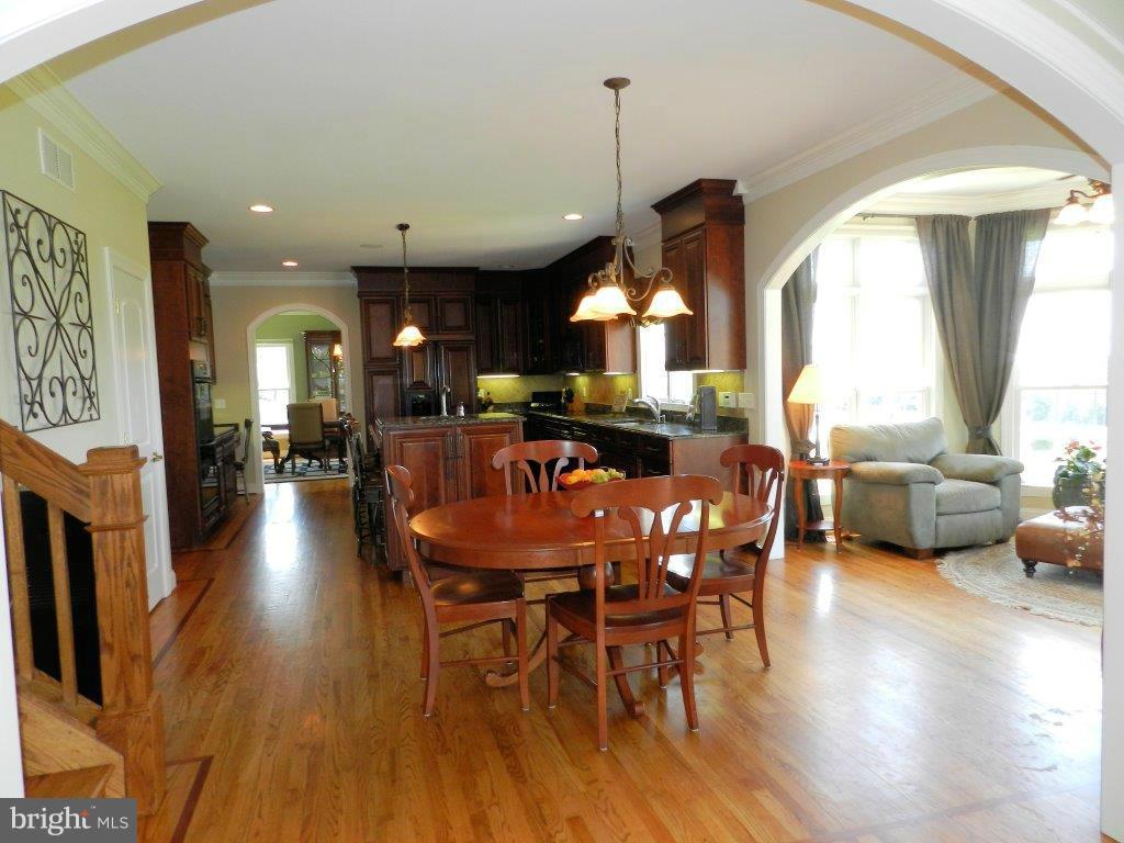 3808 Houcks Road Monkton, MD 21111 - Photo 6 of 30 a dining room with furniture window and wooden floor