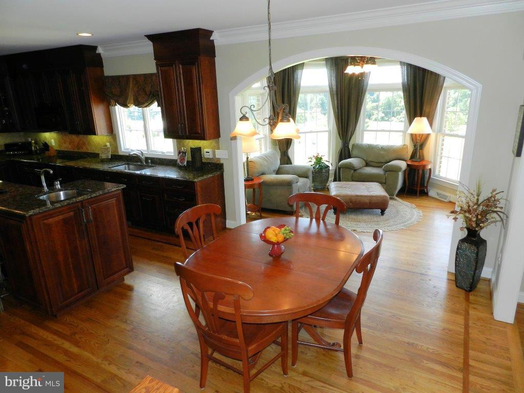 3808 Houcks Road Monkton, MD 21111 - Photo 10 of 30 a dining room with furniture and wooden floor