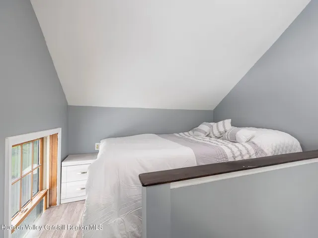 a view of house with a roof deck