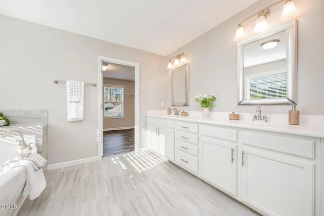 a living room with furniture and windows