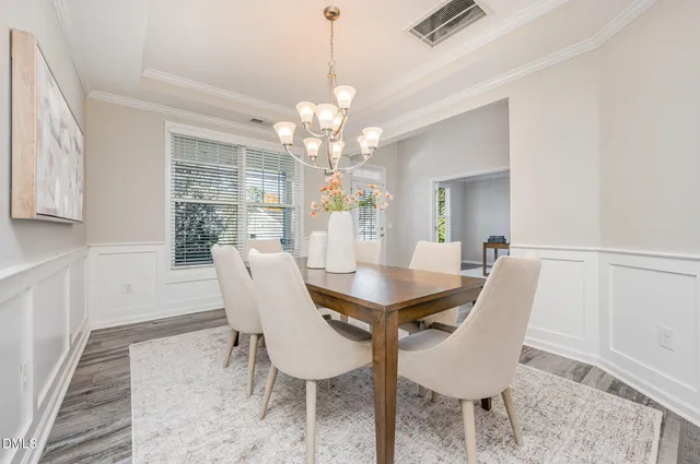 a picture of a bench in front of a building