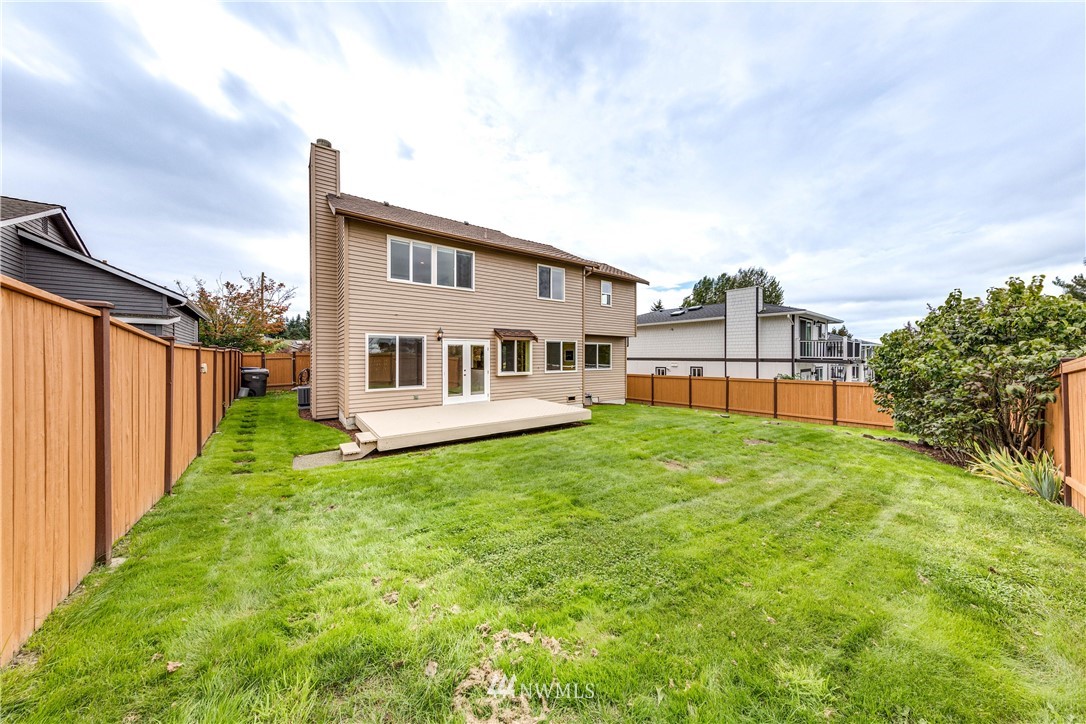 17838 85th Place Northeast Bothell, WA 98011 - Photo 13 of 16 a house view with a garden space