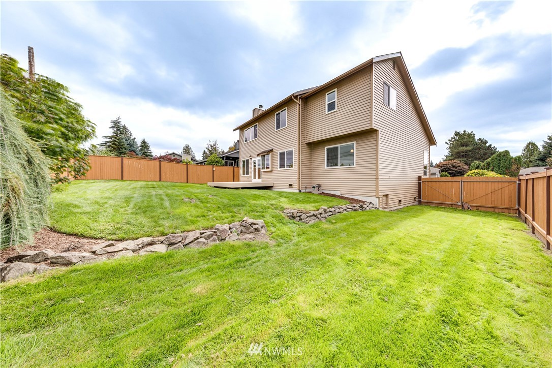 17838 85th Place Northeast Bothell, WA 98011 - Photo 14 of 16 a view of backyard with garden