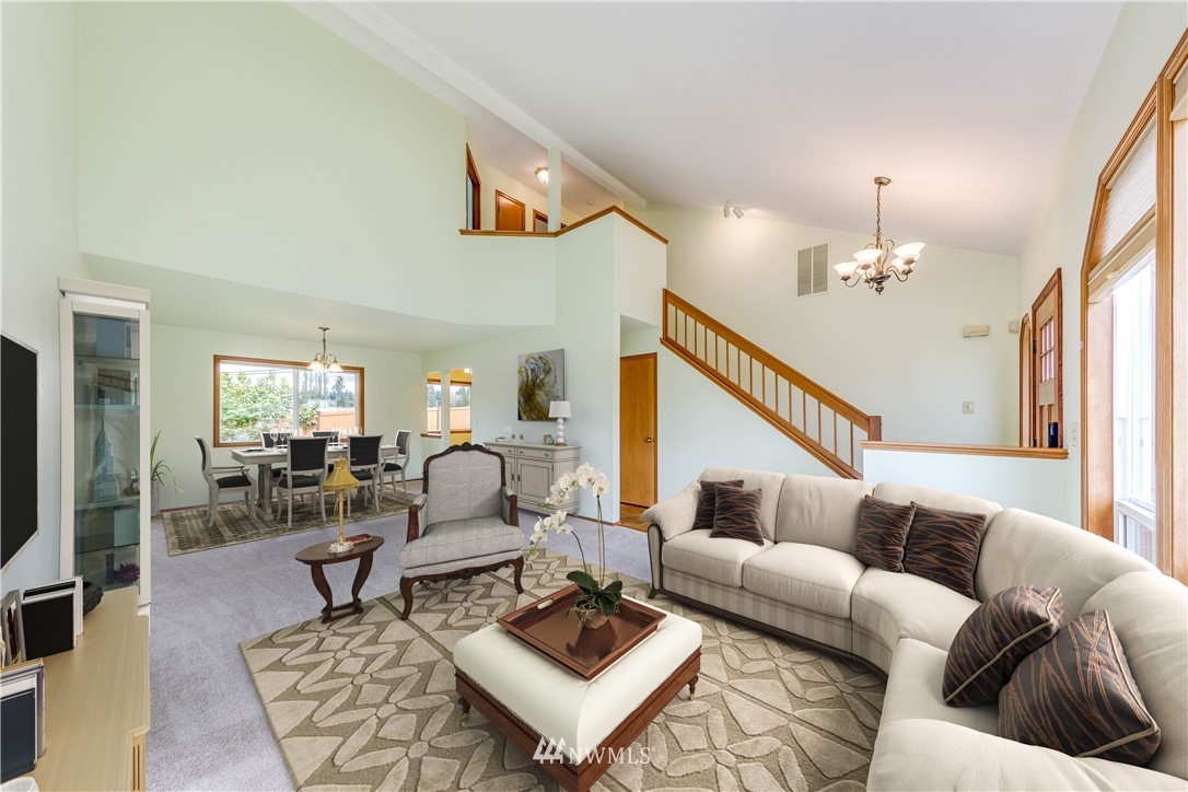 17838 85th Place Northeast Bothell, WA 98011 - Photo 3 of 16 a living room with furniture and a flat screen tv