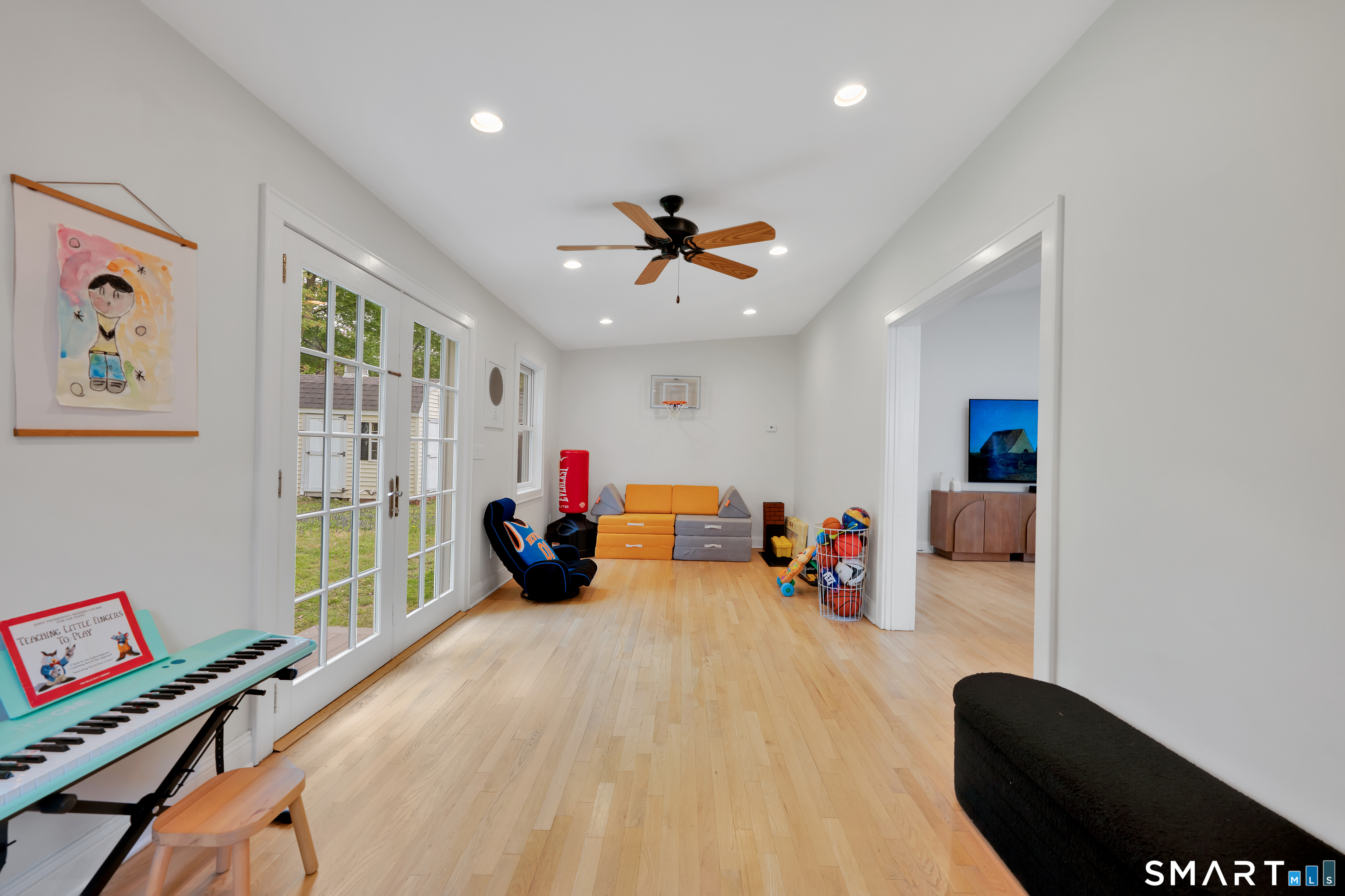 20 Lynnbrook Road Fairfield, CT 06825 - Photo 13 of 40 a children room with furniture and a chandelier