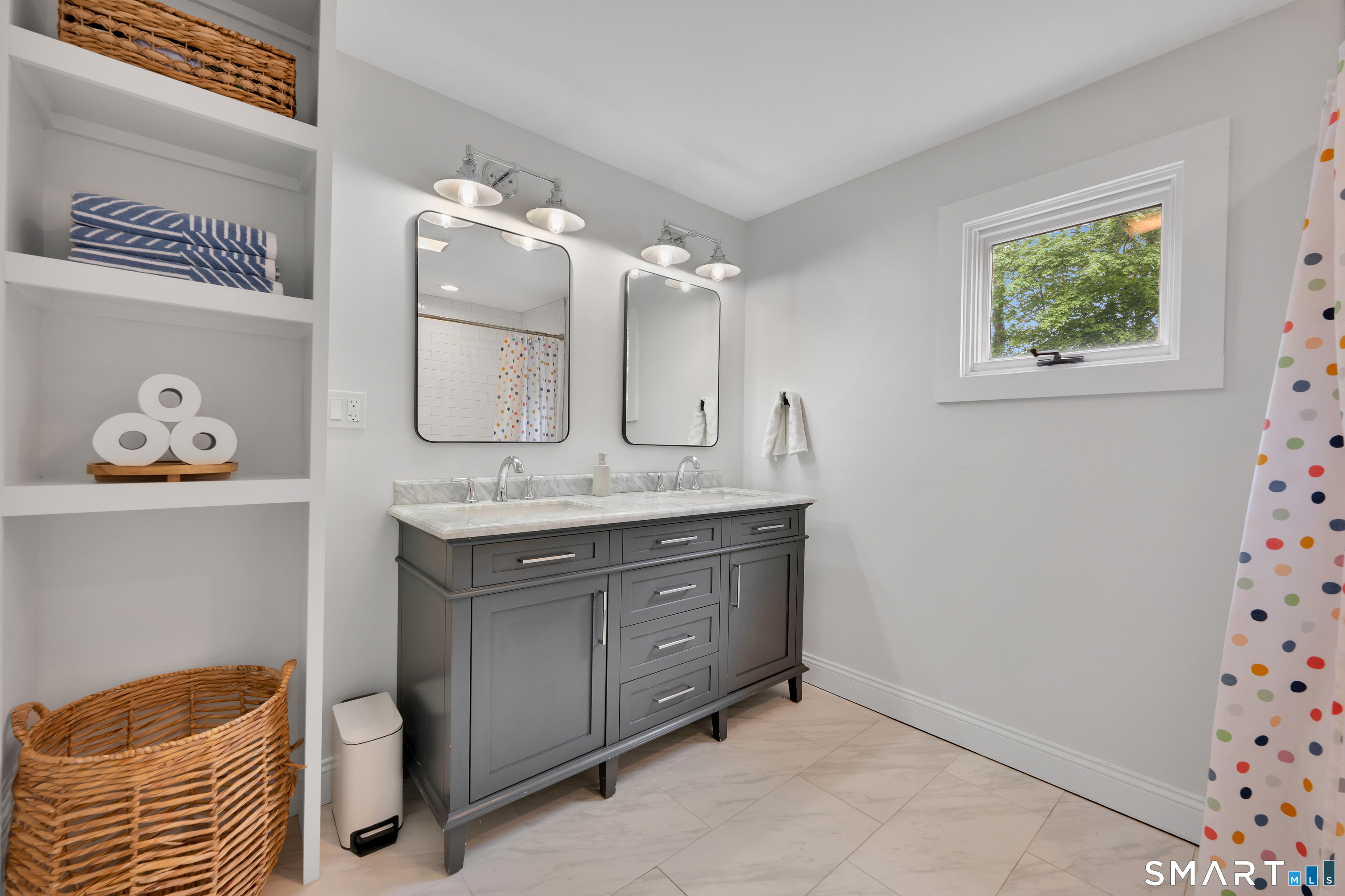 20 Lynnbrook Road Fairfield, CT 06825 - Photo 28 of 40 a bathroom with a sink and a mirror