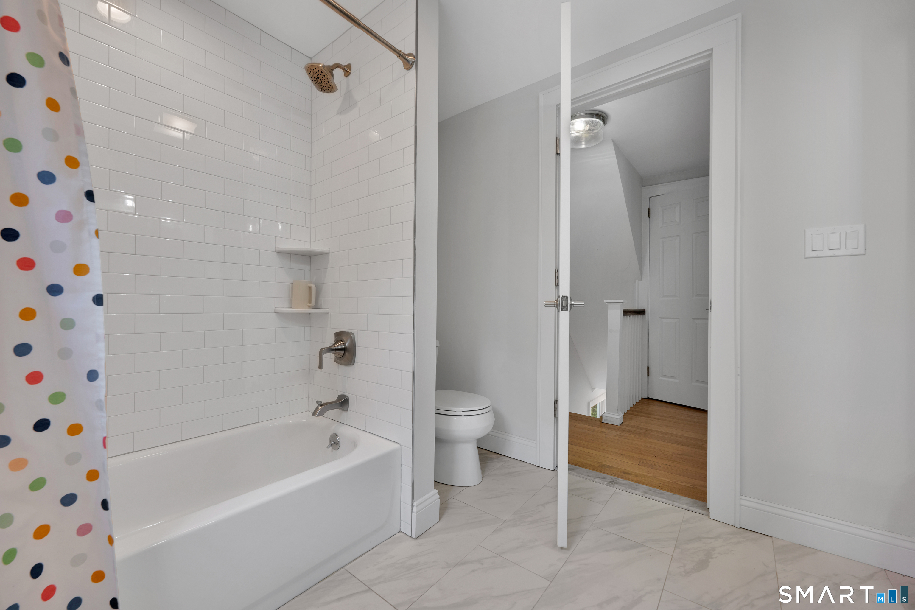 20 Lynnbrook Road Fairfield, CT 06825 - Photo 29 of 40 a bathroom with a bathtub and a shower