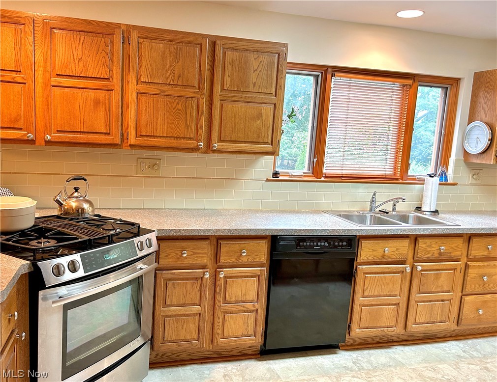 2920 Kent Road Silver Lake, OH 44224 - Photo 8 of 28 Kitchen with stainless steel gas stove.