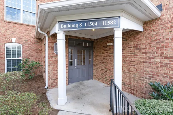 a view of entrance with a building