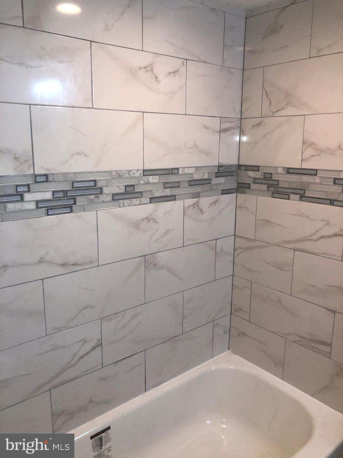 5489 Bucknell Road Baltimore, MD 21206 - Photo 15 of 26 Fully Renovated Full Bath Room in Lower Level