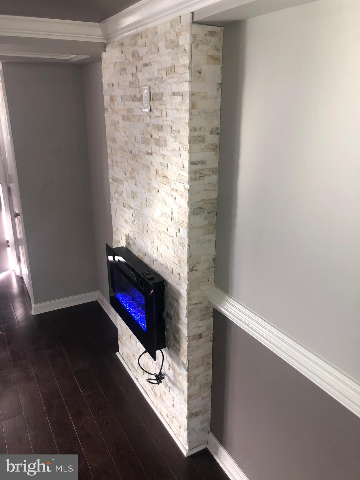 5489 Bucknell Road Baltimore, MD 21206 - Photo 8 of 26 Electric Fireplace for Cozy Evenings