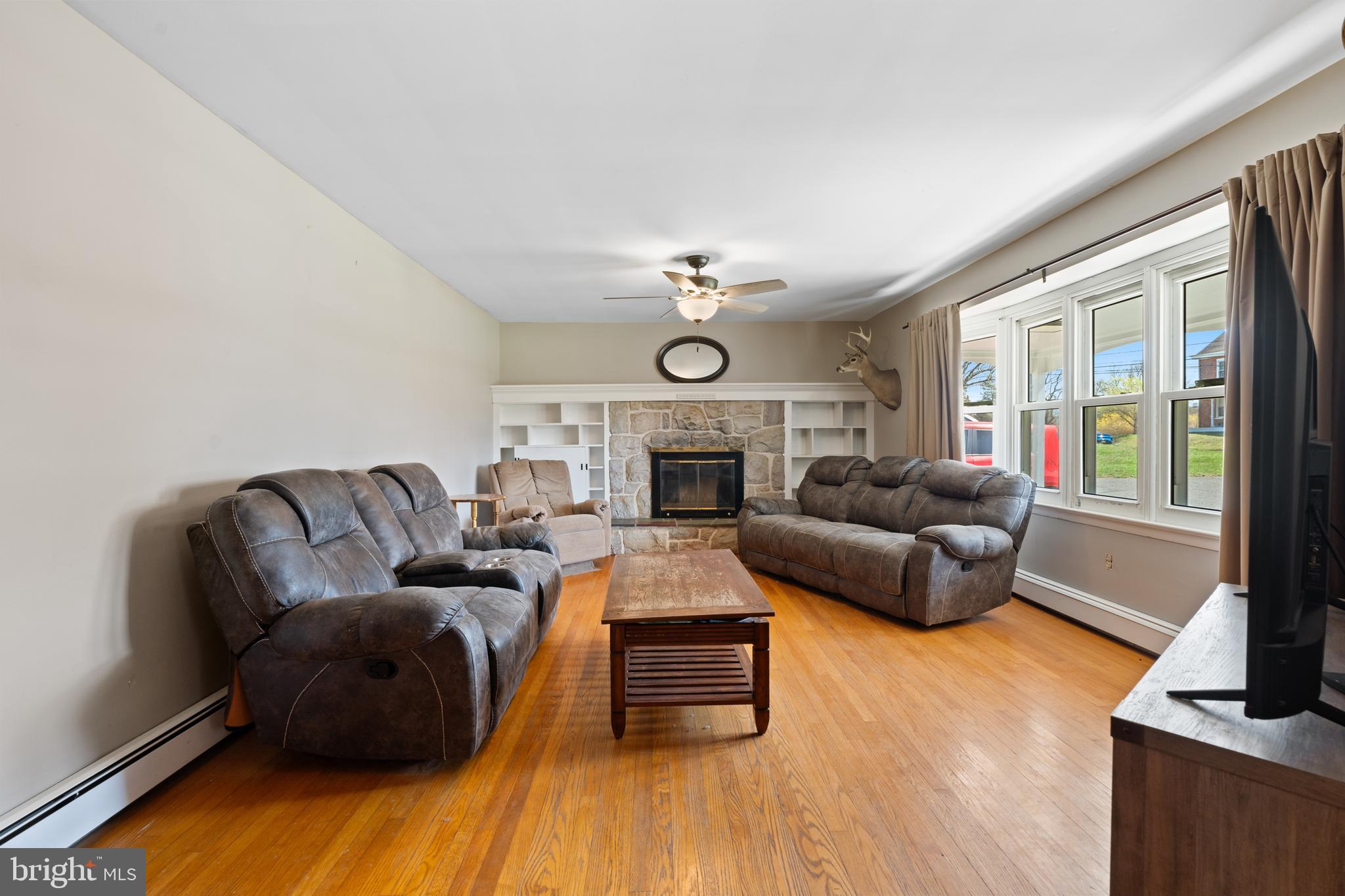 109 Big Road Perkiomenville, PA 18074 - Photo 5 of 44 Living room with stone fire place