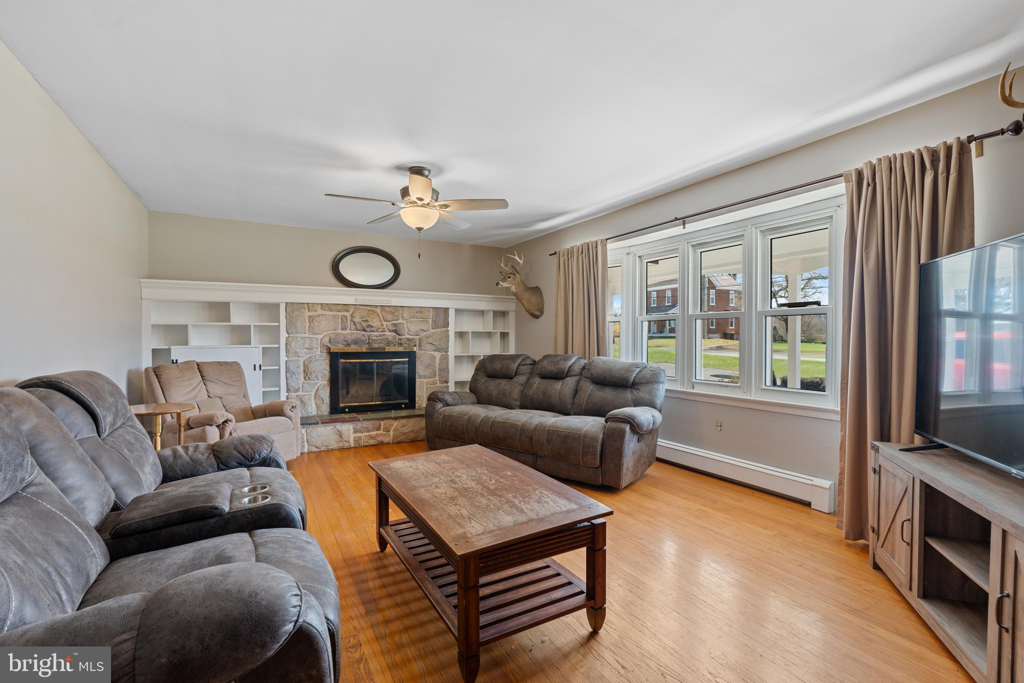 109 Big Road Perkiomenville, PA 18074 - Photo 6 of 44 Living room with stone fire place