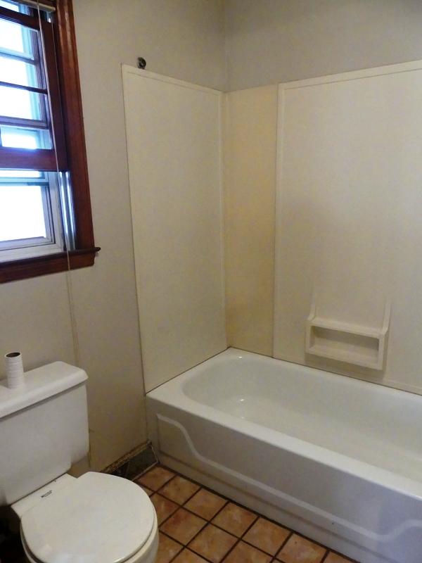 5560 Elamsville Road Stuart, VA 24171 - Photo 14 of 80 a bathroom with a toilet and a shower