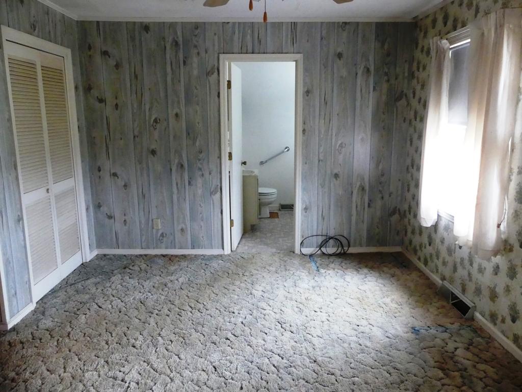 5560 Elamsville Road Stuart, VA 24171 - Photo 16 of 80 a view of an empty room with a window