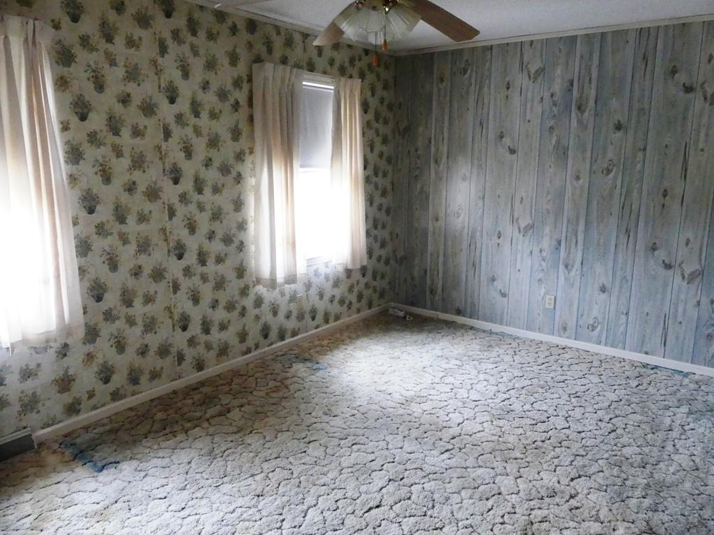 5560 Elamsville Road Stuart, VA 24171 - Photo 18 of 80 a view of an empty room with a window