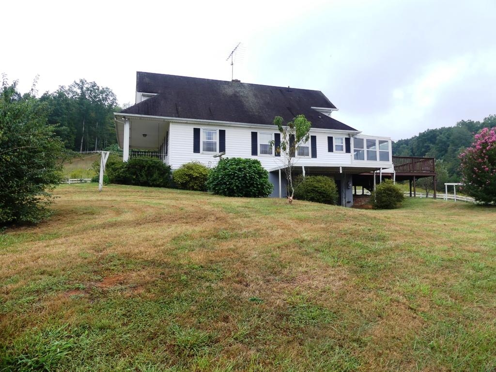 5560 Elamsville Road Stuart, VA 24171 - Photo 3 of 80 a view of house with yard and green space