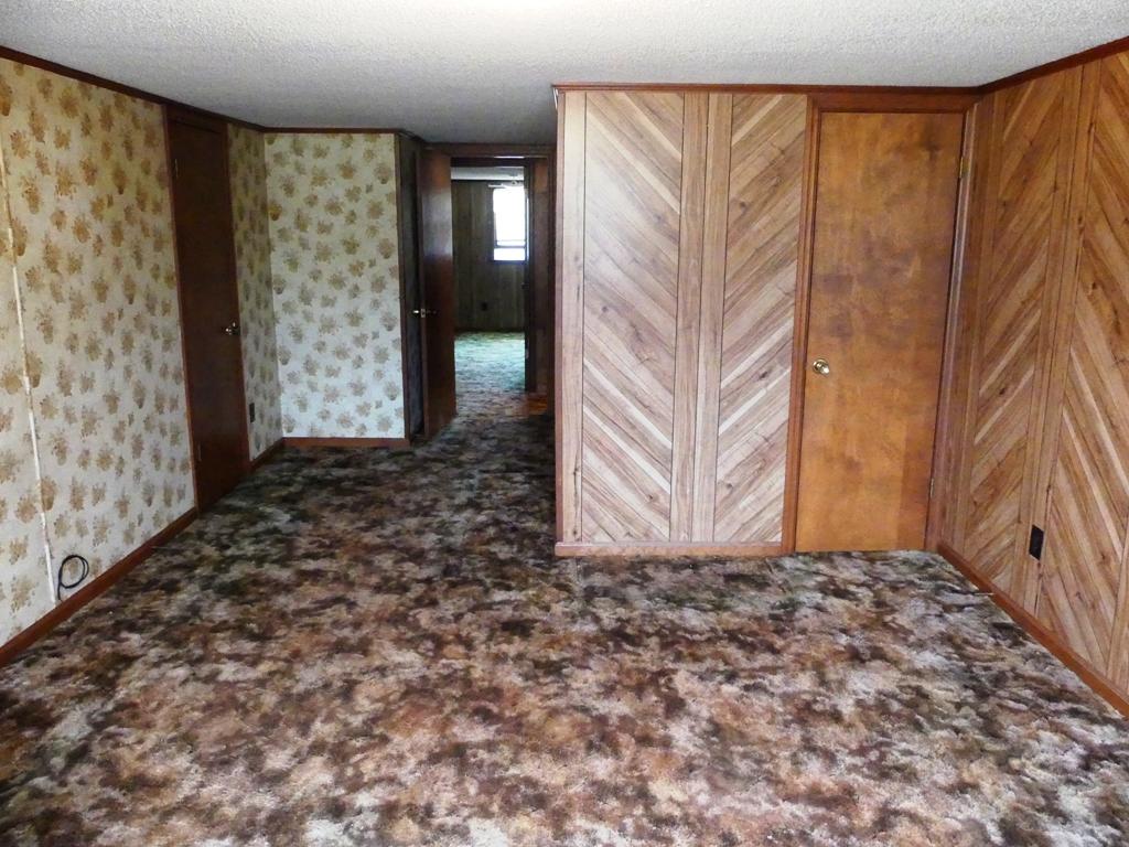 5560 Elamsville Road Stuart, VA 24171 - Photo 27 of 80 a view of a room with a door and a window