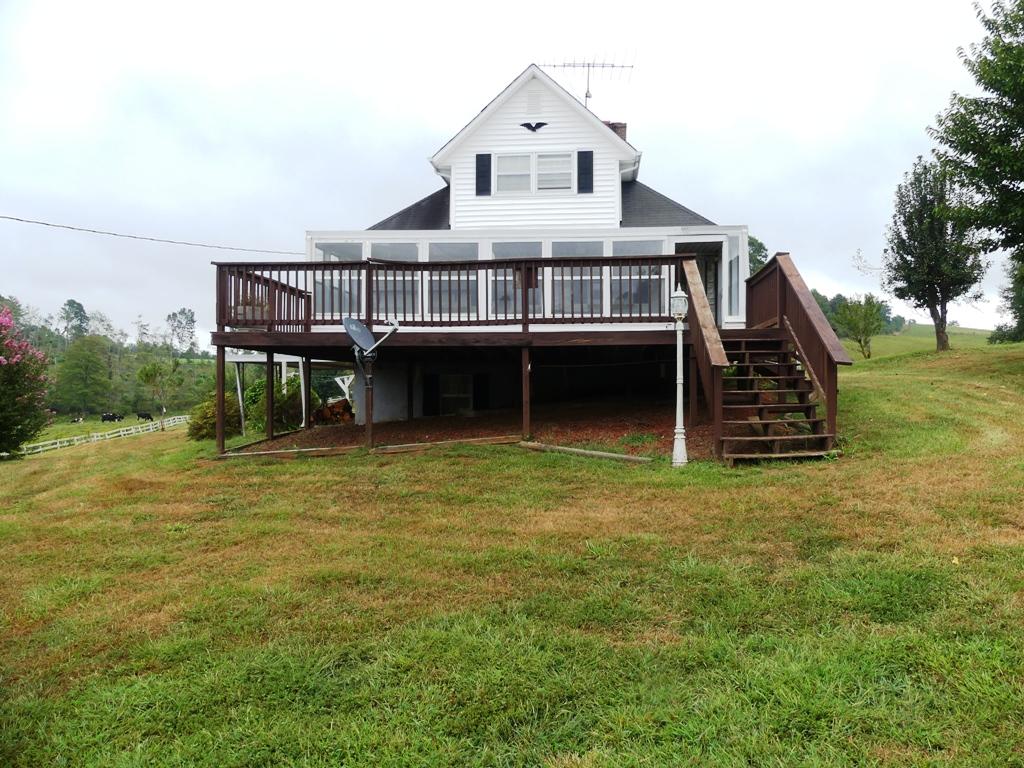 5560 Elamsville Road Stuart, VA 24171 - Photo 41 of 80 a front view of a house with a garden