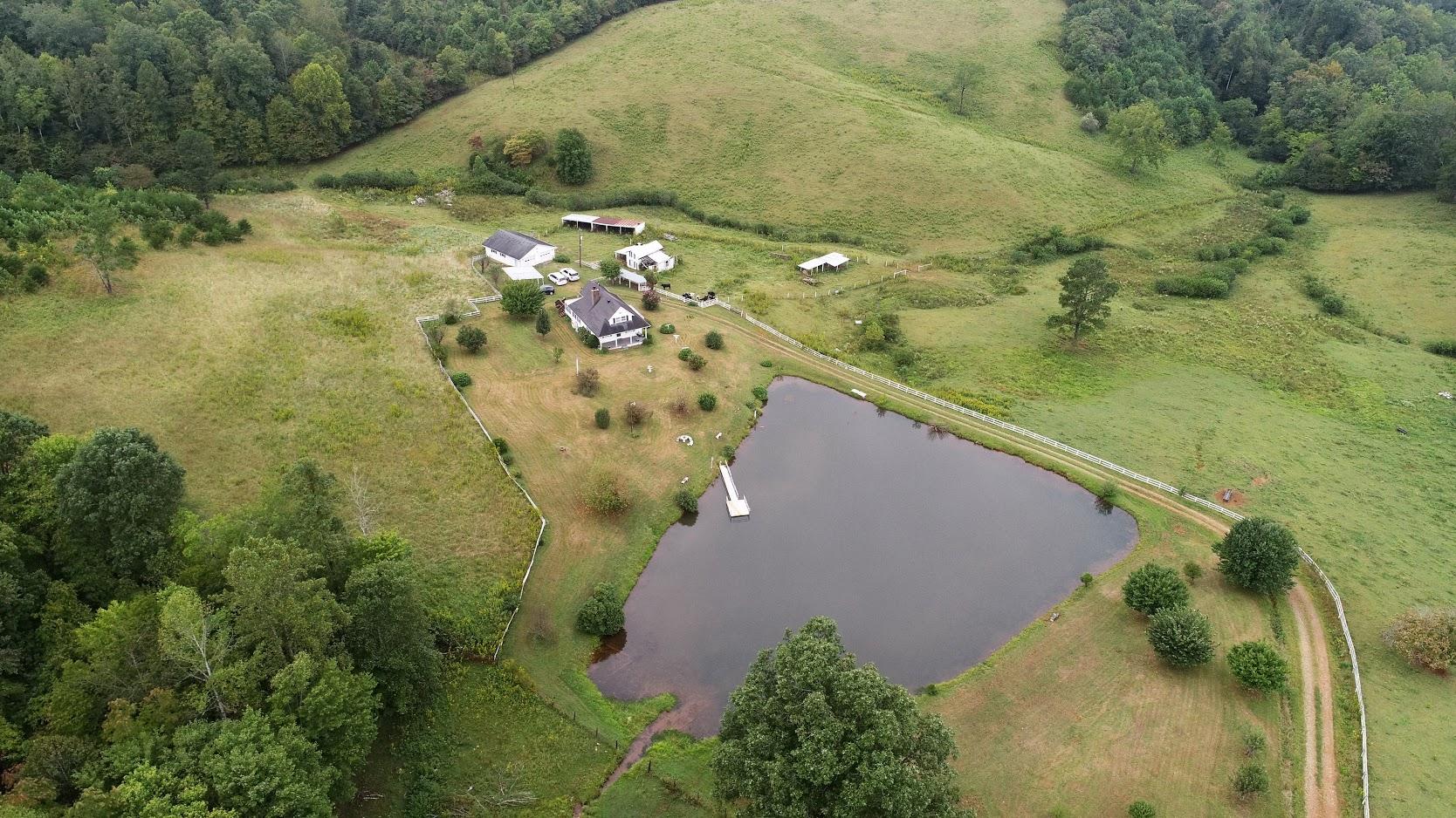 5560 Elamsville Road Stuart, VA 24171 - Photo 45 of 80 an aerial view of residential houses with outdoor space